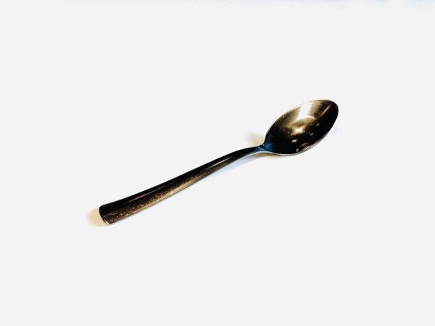 istock Stainless steel coffee spoon on white background 1924182349