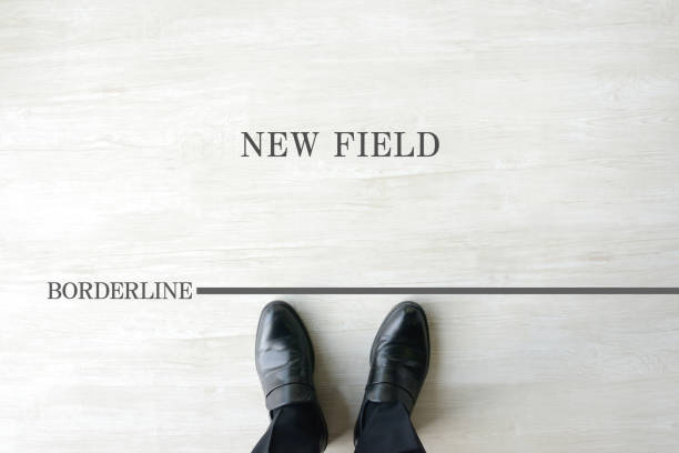 istock Business man standing by borderline for new field 1924211182