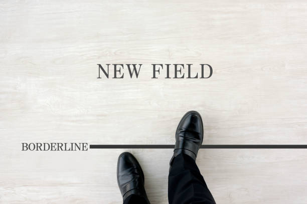 istock Business man standing by borderline for new field 1924211192