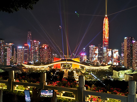 View point in Lianhuashan park, looking at Civic Center and Shenzhen flashing skyline by night, Guangdong province, China