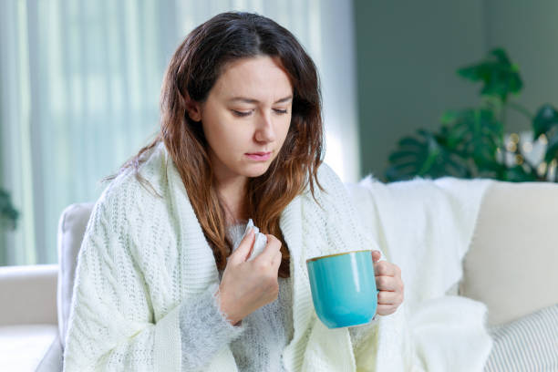 istock Sick woman resting at home 1924227170