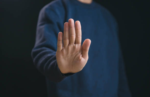 istock hand sign of men a stop 1924230683