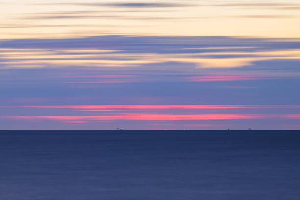 Abstract background of a sunset at the atlantic ocean, long exposure