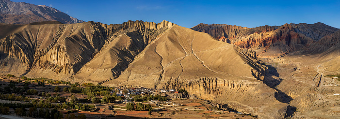 Sunrise over Ghami village. Mustang region is the former Kingdom of Lo and now part of Nepal,  in the north-central part of that country, bordering the People's Republic of China on the Tibetan plateau between the Nepalese provinces of Dolpo and Manang.