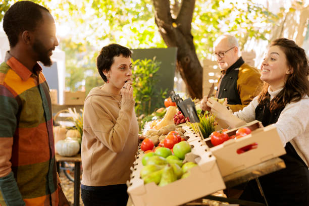 istock Farmer offers free seasonal fruit samples 1924236645