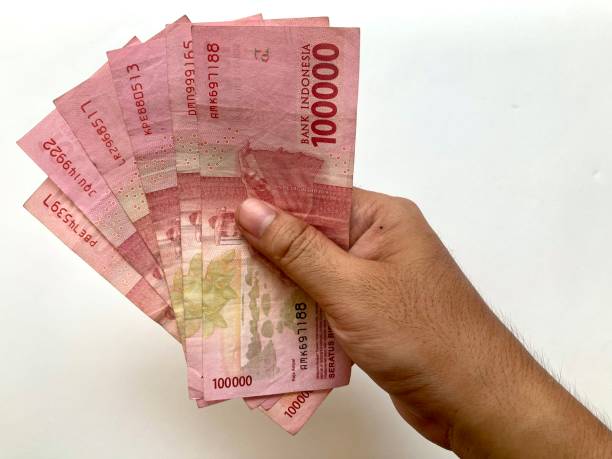 istock Indonesian Rupiah banknotes on white background 1924244109