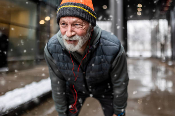 istock Senior Man's Brief Respite during Urban Exercise 1924260682