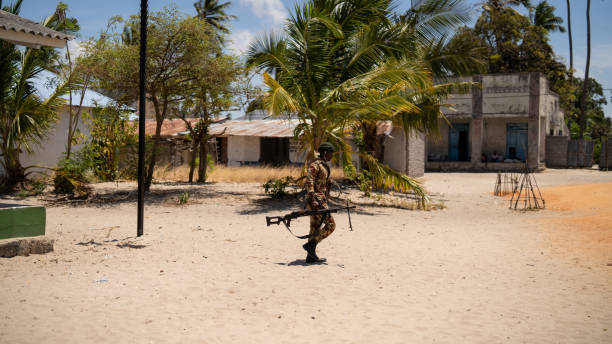 Male member of the military forces in Mocimboa da Praia, located in the Cabo Delgado region Mocimboa da Praia, Mozambique – August 16, 2023: A male member of the military forces in Mocimboa da Praia, located in the Cabo Delgado region mozambique army stock pictures, royalty-free photos & images