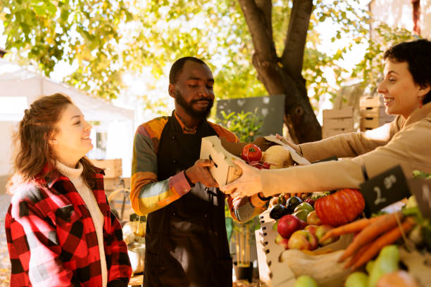 istock Vendors selling fresh homegrown produce 1924279836