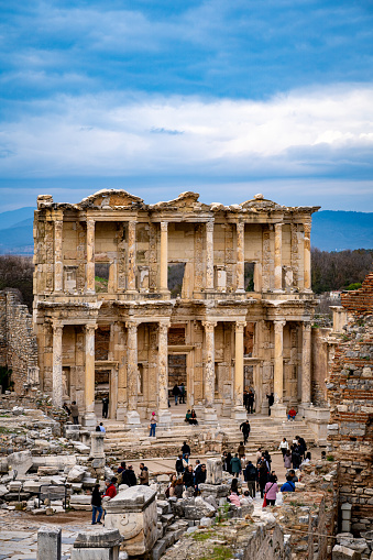Library of Celsus and tourists in the Ancient City of Ephesus. Izmir, Turkey - January 2, 2024.
