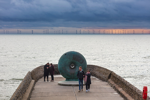 Brighton, United Kingdom - Nov 12, 2023: The sculpture Afloat, created by artist Hamish Black, is situated in Groyne on the seafront, near the Palace Pier. It is commonly referred to as the 