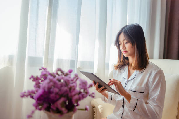 istock woman in the bedroom 1924340824