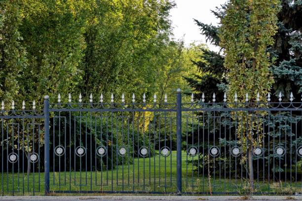 istock Openwork metal fence with peaks. 1924351466