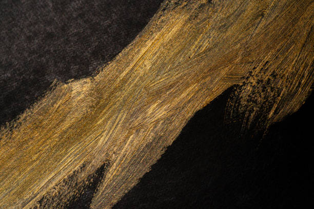 istock Shining gold on a black background 1924352514