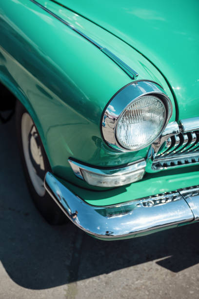 istock Front right corner of old turquoise car 1924359608