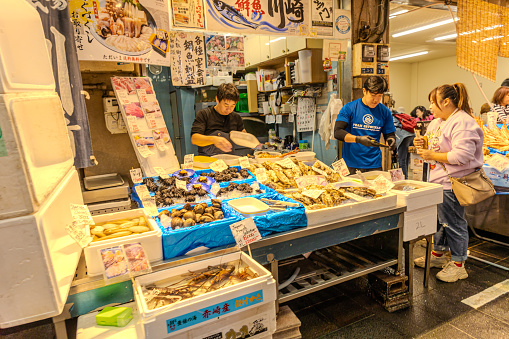 2023-11-11 Osaka, Japan. Fresh seafood on display at a Japanese fish market