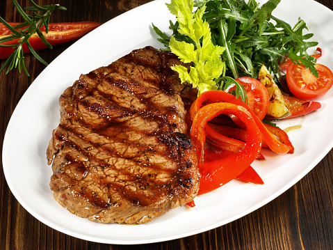 Grilled Striploin Beef Steak with grilled Pepper and Rocket Salad