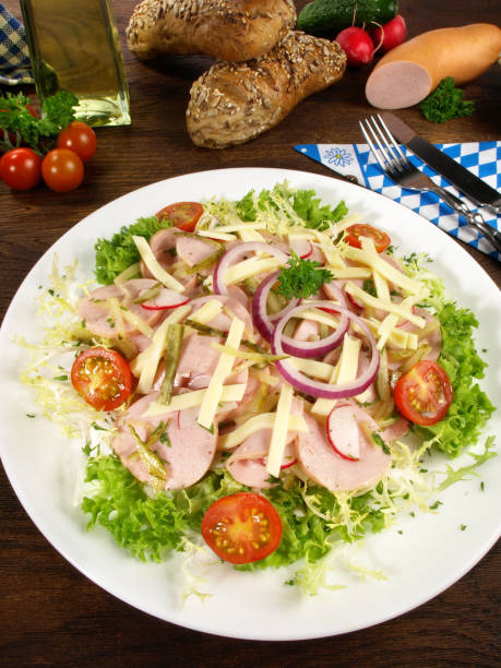 German Sausage Salad with Pickles and Onions