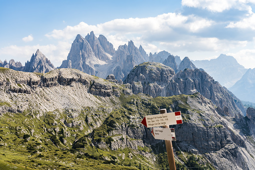 Trail sign for hiking trails in the Dolomites in the Italian Alps near Refugio Auronzo