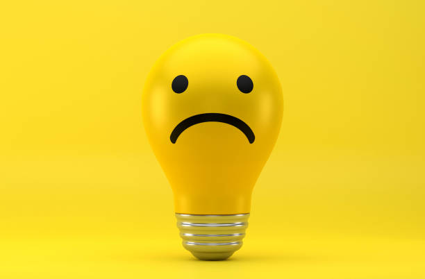istock Light Bulb And Unhappy Emoji 1924394172