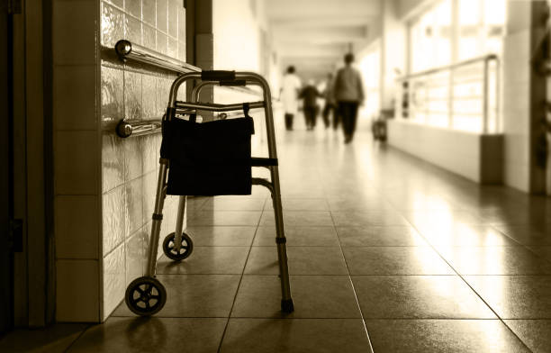 Metal rollator parked in care home hallway