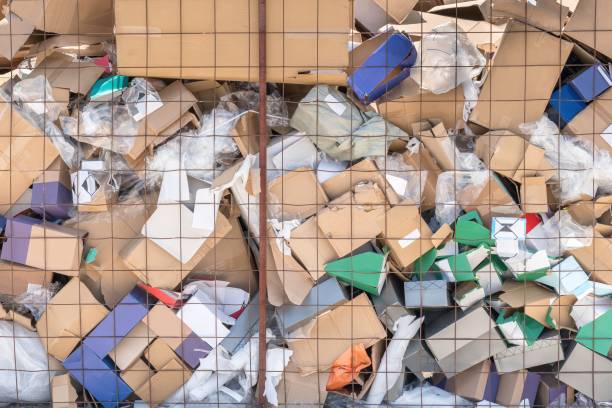 istock Cardboard waste pile stacked on a landfill 1924430461