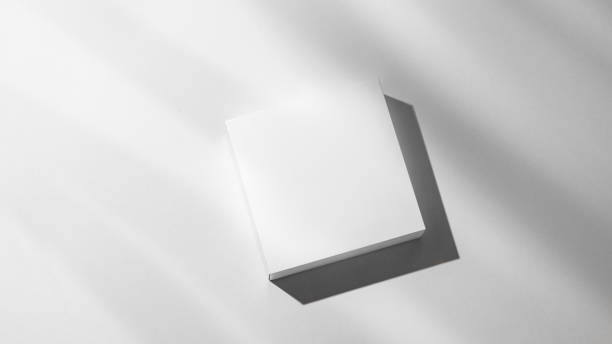 istock Modern empty podium for product. Minimal white box with shadows on a light background. 1924462280