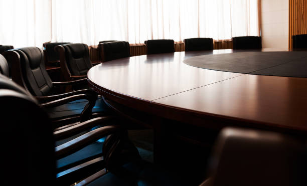 conference table and chairs in modern meeting room - 社内会議 ストックフォトと画像