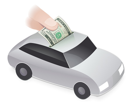 A hand drops an American 20 dollar bill into the slot of a roof of a white car on a white background