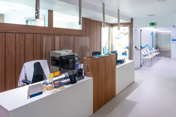 istock Hall of an hospital with a reception without people 1924488317