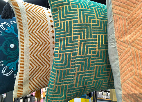 Beautiful Horizontal Cushions with Decorative Patterns on a Display Exhibition Inside a Store