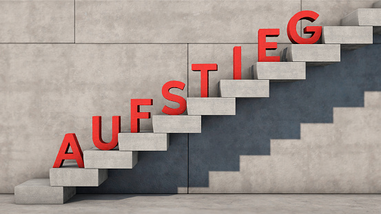 Symbolic image: Staircase with red letters as the German word 
