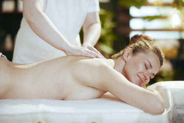 istock massage therapist in spa salon massaging client 1924527695