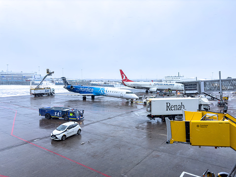 A row of Scandinavian Airlines airplanes at Arlanda Airport, Sweden.