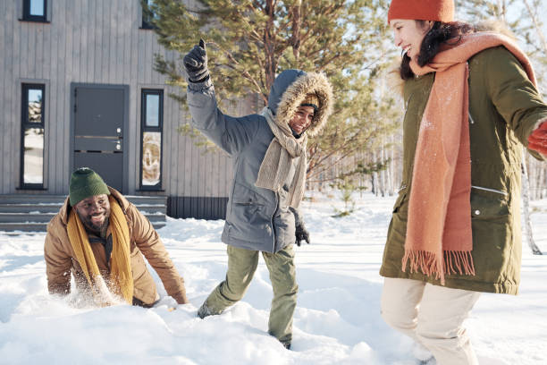 istock Cheerful boy playing with his parents 1924556565