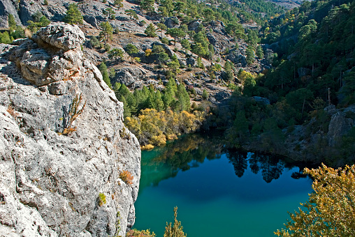 Black water lagoon on the Borosa River route, in the Cazorla, Segura and Las Villas natural park.