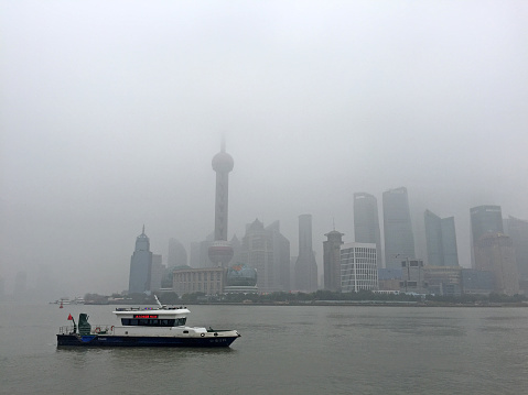 Shanghai city building in the fog and haze