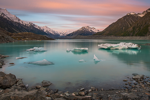 Tasman Glacier is the longest glacier in New Zealand.  The glacier melts in spring and floats in the lake.   It is particularly stunning at sunset hours.