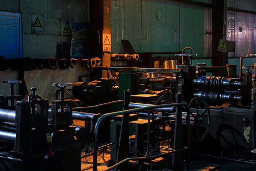 Interior view of steel mill with variety of equipment's manufactured from recycled metal.