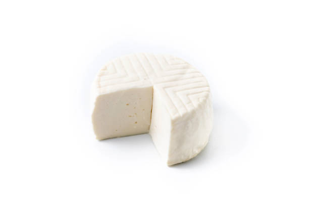istock Sliced fresh white cheese from cow's milk isolated on white background 1924666462