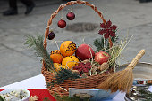 A beautifully decorated wicker basket full of fruit
