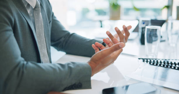 istock Business, hands or gesture with documents for discussion, meeting or communication at work desk in office. Professional, person or employee with feedback, review or coaching at workplace for training 1924724742