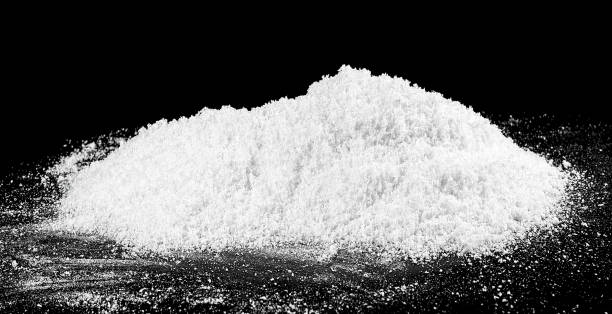 istock Pile of white snow isolated on a black background. White fluffy snow. 1924724762