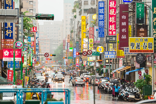 Horizontal color image of Taiyuan Road in Taipei, Taiwan during a rainy day.