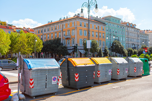 Trash bins on the city street in Europe