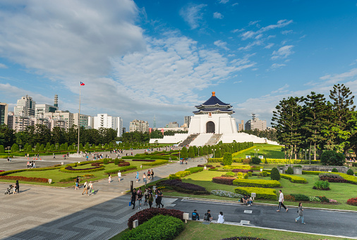 Kaohsiung, Taiwan - April 29, 2019: The Fo Guang Big Buddha and the Four Noble Truths Stupas in the Fo Guang Shan Buddha Museum on blue sky background. Taiwan is a popular tourist destination of Asia.