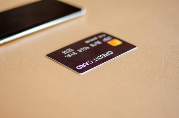 istock Black credit card used for financial transactions 1924767506