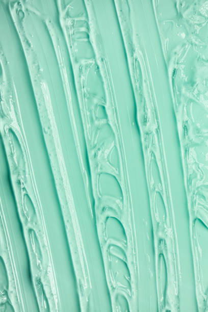 istock Light blue turquoise green aqua cosmetic texture. Gel smudge swatch on background. 1924777814