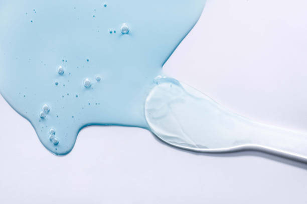 istock Light blue gray transparent white cosmetic texture. Gel smudge swatch on background. 1924785040