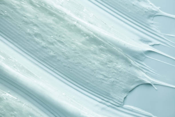istock Light blue gray transparent white cosmetic texture. Gel smudge swatch on background. 1924787985